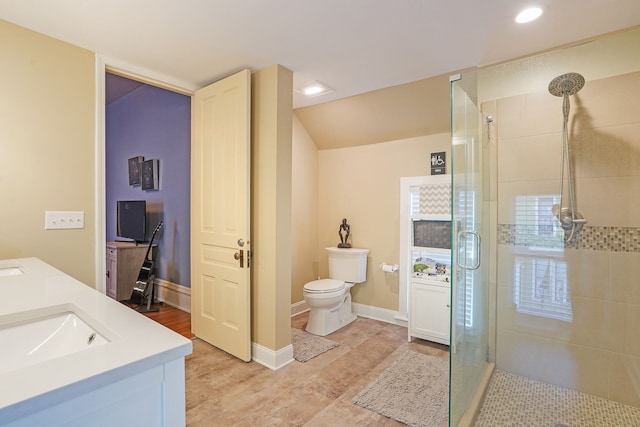 529 Fountain St NE, Grand Rapids, MI 49503 - full bath featuring a stall shower, toilet, double vanity, wood finished floors, and recessed lighting