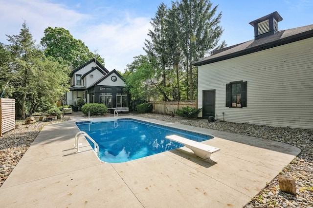 529 Fountain St NE, Grand Rapids, MI 49503 - view of swimming pool with a patio, fence, and a diving board