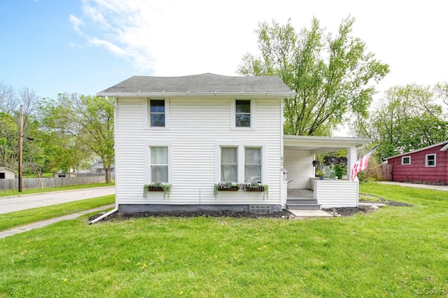 american foursquare style home with a porch