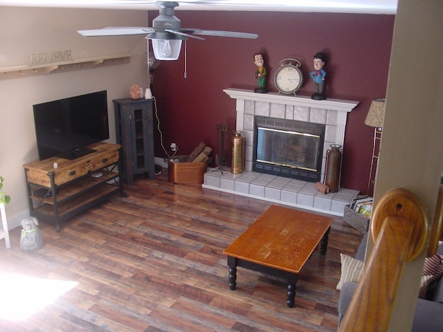 10832 Eagle Cove Dr, South Lyon, MI 48178 - living room with a ceiling fan, wood finished floors, and a fireplace