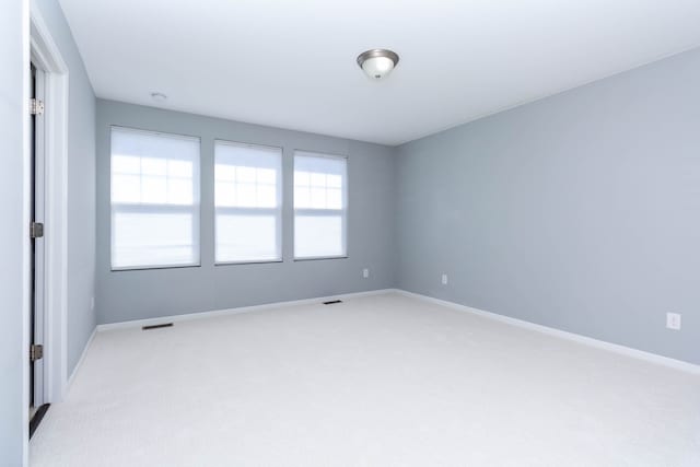 951 Barclay Cir Unit 48, Rochester Hills, MI 48307 - unfurnished room with light carpet and baseboards