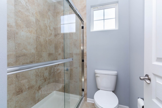 951 Barclay Cir Unit 48, Rochester Hills, MI 48307 - full bathroom featuring a stall shower, toilet, and baseboards