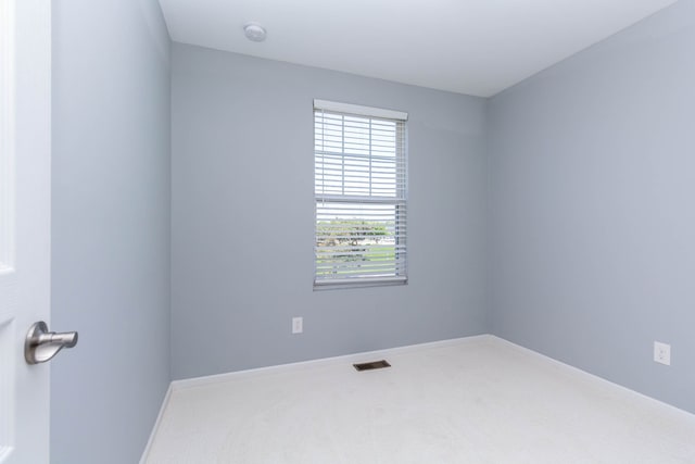 951 Barclay Cir Unit 48, Rochester Hills, MI 48307 - carpeted empty room with baseboards and a smoke detector