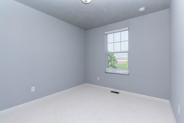 951 Barclay Cir Unit 48, Rochester Hills, MI 48307 - carpeted spare room with baseboards
