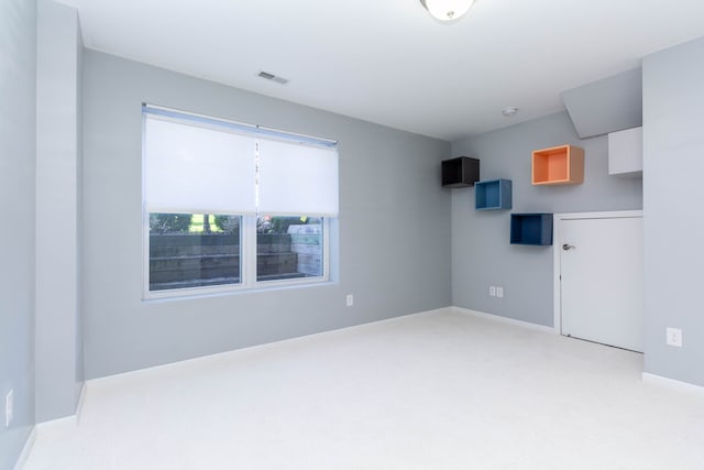 951 Barclay Cir Unit 48, Rochester Hills, MI 48307 - empty room with carpet floors and baseboards