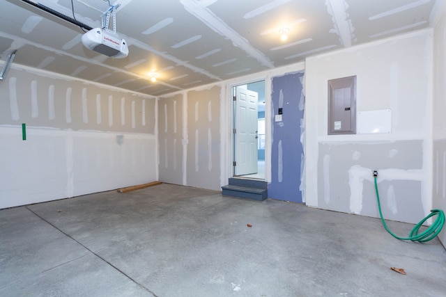 951 Barclay Cir Unit 48, Rochester Hills, MI 48307 - garage featuring a garage door opener and electric panel