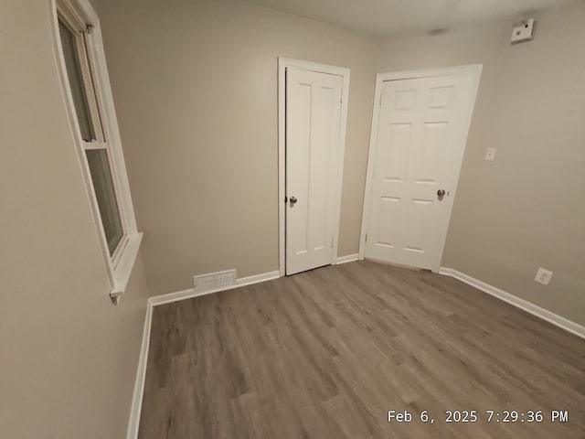 1778 Reo Ave, Lincoln Park, MI 48146 - unfurnished room with wood finished floors and baseboards