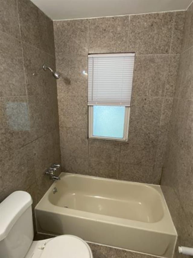 1778 Reo Ave, Lincoln Park, MI 48146 - full bathroom featuring toilet and  shower combination