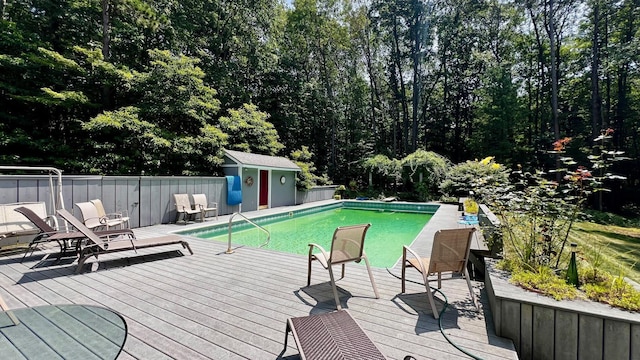 1821 W Hansen Rd, Scottville, MI 49454 - view of pool featuring a deck and an outbuilding