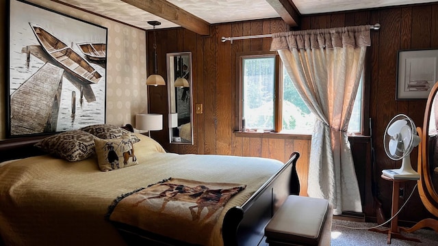 1821 W Hansen Rd, Scottville, MI 49454 - carpeted bedroom featuring beamed ceiling and wood walls