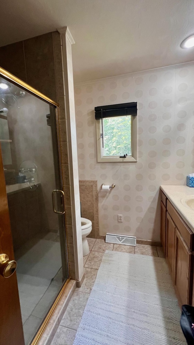 1821 W Hansen Rd, Scottville, MI 49454 - full bath featuring tile patterned floors, a shower stall, ornamental molding, toilet, and vanity