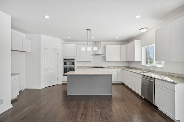 20859 Hasenclever Dr, South Lyon, MI 48178 - kitchen with wall chimney range hood, stainless steel appliances, a sink, a kitchen island, and white cabinets