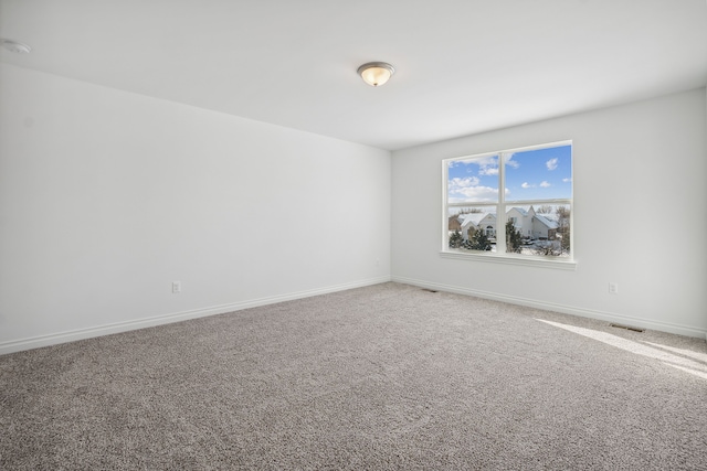 20859 Hasenclever Dr, South Lyon, MI 48178 - carpeted empty room featuring baseboards