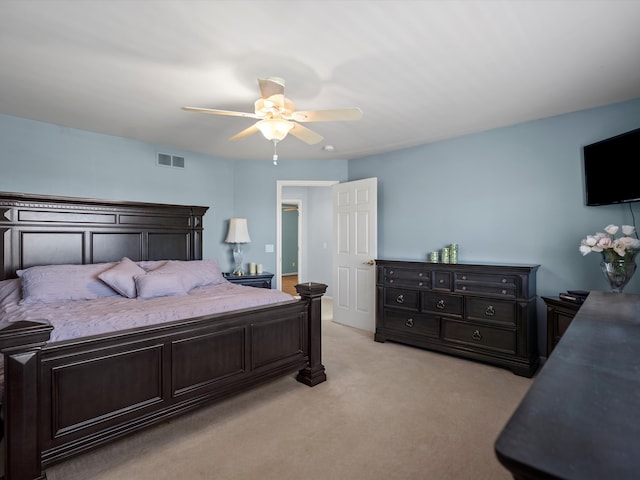 7111 Tucker Rd, Holly, MI 48442 - bedroom with light colored carpet and a ceiling fan