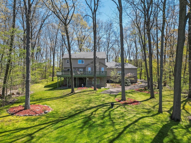 7111 Tucker Rd, Holly, MI 48442 - view of front of home featuring a deck and a front lawn