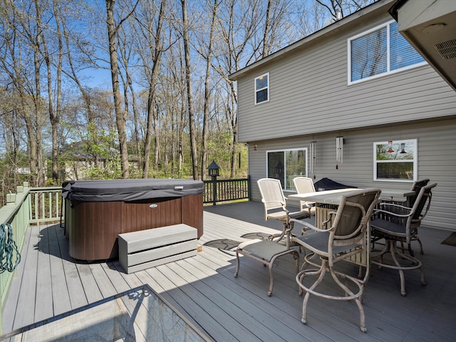 7111 Tucker Rd, Holly, MI 48442 - deck featuring a hot tub and outdoor dining space
