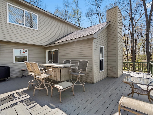 7111 Tucker Rd, Holly, MI 48442 - deck featuring outdoor dining area