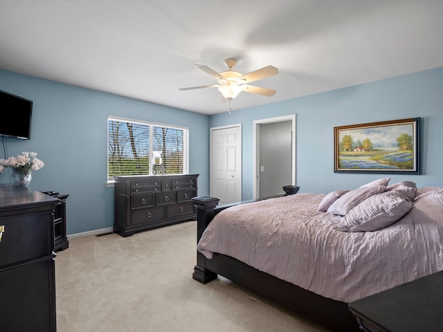 7111 Tucker Rd, Holly, MI 48442 - bedroom featuring light colored carpet, baseboards, and ceiling fan
