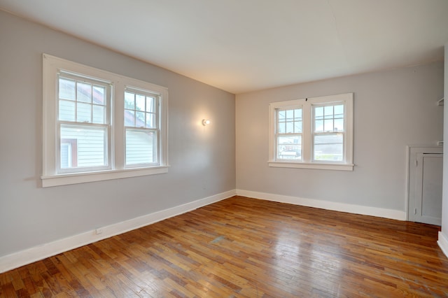 715 N St, Mount Morris, MI 48458 - unfurnished room featuring hardwood / wood-style floors and baseboards