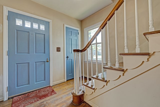 419 S State Rd, Davison, MI 48423 - foyer with light wood-style flooring, stairs, and baseboards