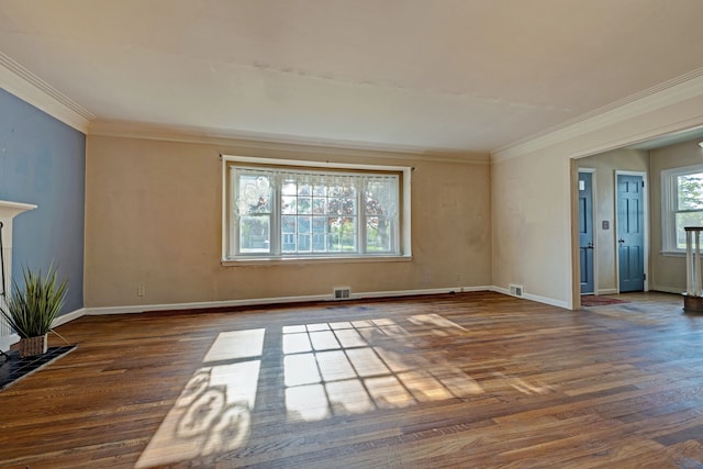 419 S State Rd, Davison, MI 48423 - unfurnished living room featuring wood finished floors, crown molding, and baseboards