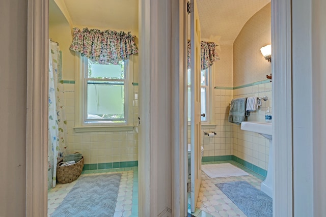 419 S State Rd, Davison, MI 48423 - full bathroom with tile walls and toilet