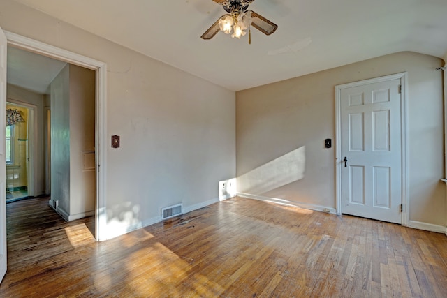419 S State Rd, Davison, MI 48423 - unfurnished room featuring ceiling fan, wood finished floors, baseboards, and lofted ceiling
