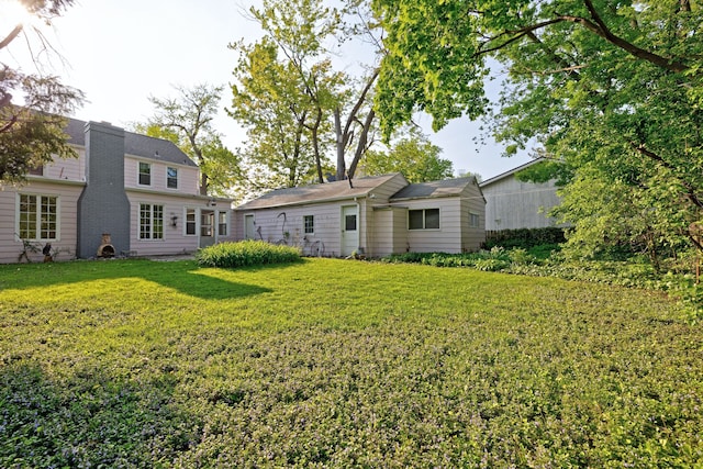 419 S State Rd, Davison, MI 48423 - rear view of property with a yard and a chimney