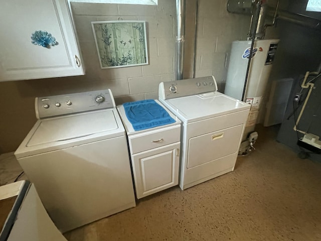950 Raymond St, Ann Arbor, MI 48103 - laundry area featuring washing machine and clothes dryer, water heater, concrete block wall, and cabinet space