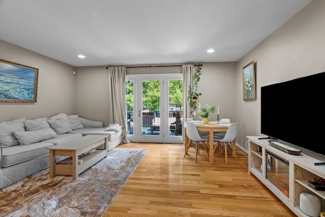 363 Vester St, Ferndale, MI 48220 - living room featuring healthy amount of natural light, recessed lighting, light wood-style flooring, and baseboards
