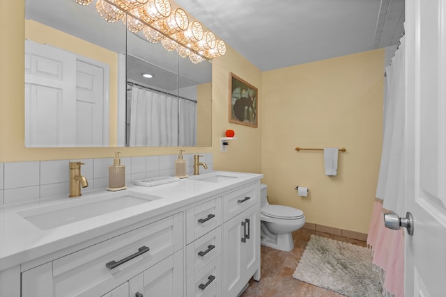 363 Vester St, Ferndale, MI 48220 - full bathroom with toilet, double vanity, baseboards, a chandelier, and decorative backsplash