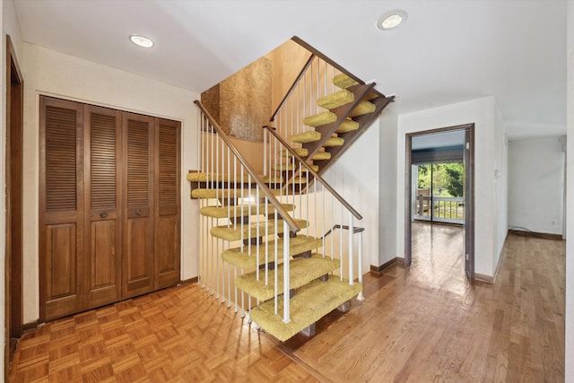 stairway with baseboards