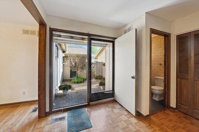 doorway with baseboards
