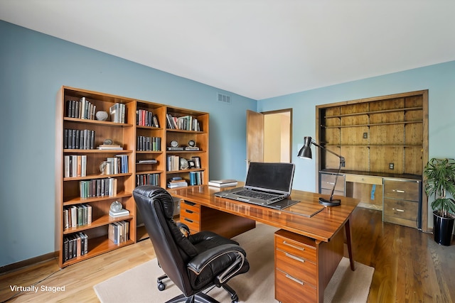 office with wood finished floors