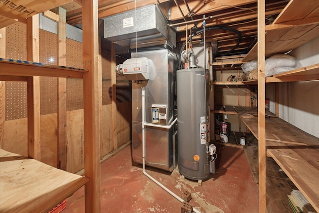 utility room featuring gas water heater