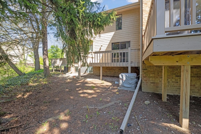rear view of property with a deck