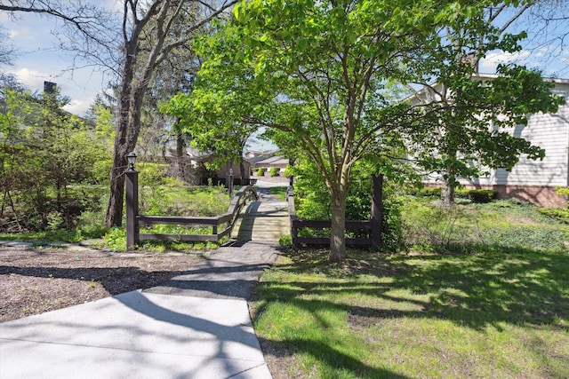 surrounding community with a lawn