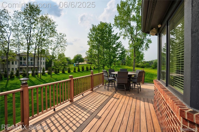 8320 Misty Mdws, Grand Blanc, MI 48439 - wooden deck featuring outdoor dining space and a lawn
