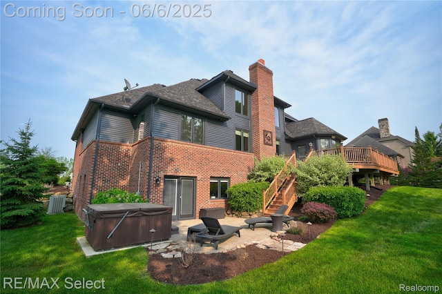 8320 Misty Mdws, Grand Blanc, MI 48439 - rear view of property featuring a hot tub, stairway, a chimney, a yard, and a patio area