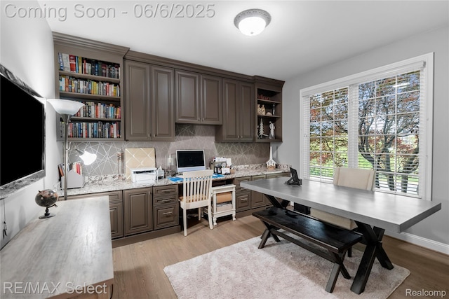 8320 Misty Mdws, Grand Blanc, MI 48439 - office space featuring light wood-style floors and built in study area