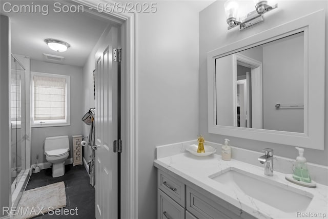 8320 Misty Mdws, Grand Blanc, MI 48439 - bathroom with vanity, toilet, a stall shower, and tile patterned flooring