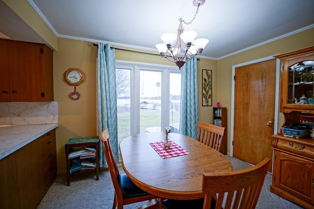 1090 Sunset Dr, Holly, MI 48442 - dining room featuring a chandelier, light colored carpet, and crown molding