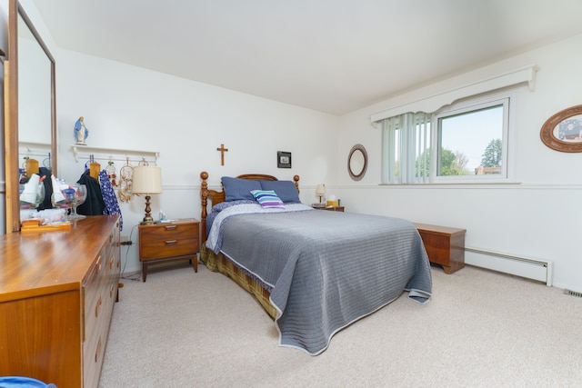 3683 Elmwood, Vassar, MI 48768 - bedroom featuring a baseboard radiator and light carpet