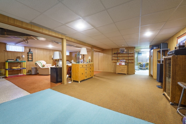 3683 Elmwood, Vassar, MI 48768 - below grade area with carpet, a drop ceiling, and wood walls