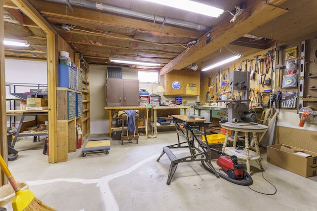 3683 Elmwood, Vassar, MI 48768 - basement featuring a workshop area