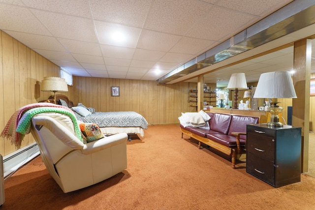 3683 Elmwood, Vassar, MI 48768 - carpeted bedroom with a baseboard heating unit, a paneled ceiling, and wooden walls