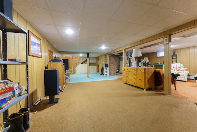 3683 Elmwood, Vassar, MI 48768 - basement featuring carpet, stairway, a drop ceiling, and wooden walls