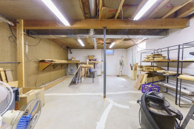 3683 Elmwood, Vassar, MI 48768 - unfinished basement with a workshop area