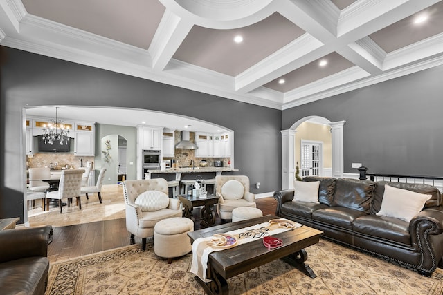 25031 Newton St, Dearborn, MI 48124 - living area featuring ornate columns, arched walkways, ornamental molding, beamed ceiling, and coffered ceiling