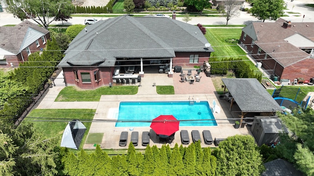 25031 Newton St, Dearborn, MI 48124 - view of swimming pool featuring fence and a patio area
